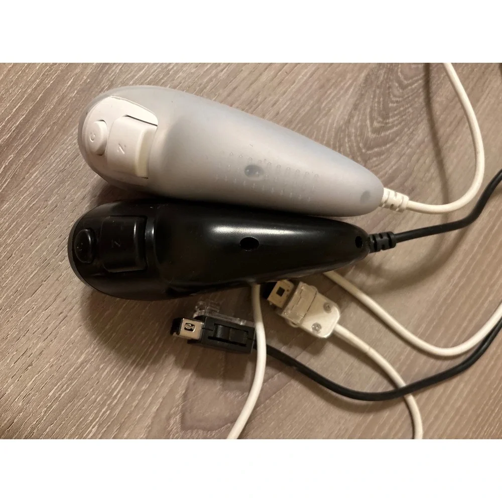 Nintendo Wii Nunchuk Controller Pair Black and White RVL-004 OEM Authentic‎